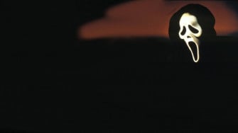 Caption Ghostface From The Scream Franchise Wallpaper
