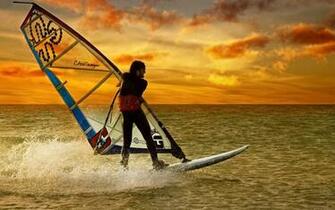 Surfing At Sunset Wallpaper Screensaver