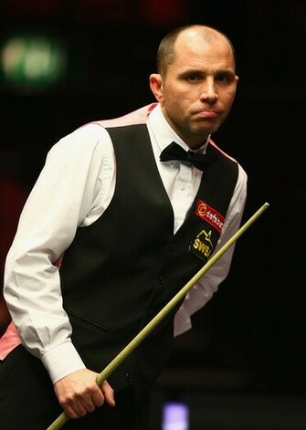Joe Perry Of England Looks On During His First Round Match