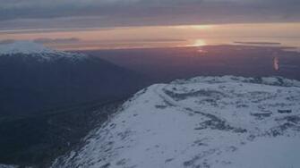 4k Stock Footage Aerial Video Snowy Slope Reveal Alpenglow At