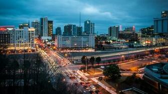City Lights Buildings Vehicles Ocean Sea Bridge Cars People Cloudy Sky