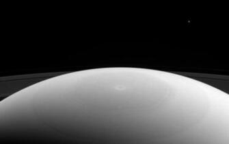 Space Image Mimas Dwarfed