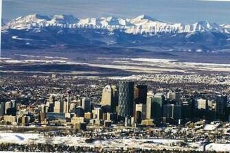 Calgary With The Rockies In Background Places To Visit