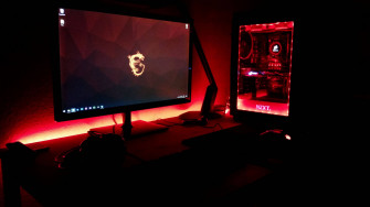 Red Themed Gaming Setup Wallpaper