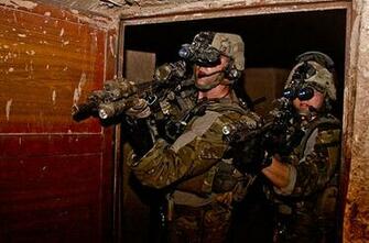 Rangers With The 75th Ranger Regiment Clear A Compound During An