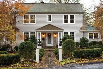 Trimmed Hedges And Topiary Complement The Dutch Colonial