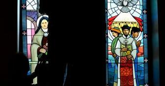 Stained Glass Windows Go In At Lansing Catholic Chapel