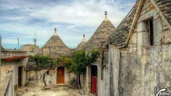 Unique Trulli Constructed Houses In Alberobello Italy Wallpaper