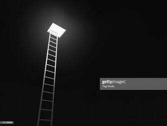 Ladder Leading To The Exit Black Background High Res Stock Photo