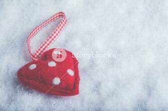 Red Toy Suave Heart On A Frosty White Snow Winter Background