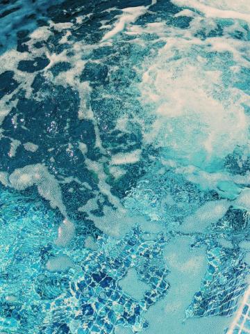 Brown And Black Stone In Water Photo Blue Image