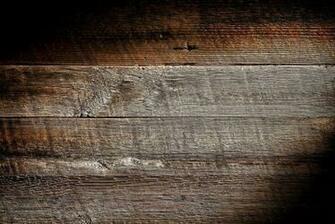 Old And Distressed Antique Grey Board Made Of Rough Sawn Barn Wood