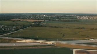 HD Stock Footage Aerial Video Of Flying Over Way And Farm