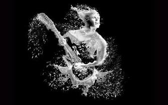 Liquid Guitar Player Wallpaper