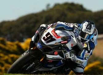 This Motorcycle Picture Captures A Rider Making Sharp Turn Around