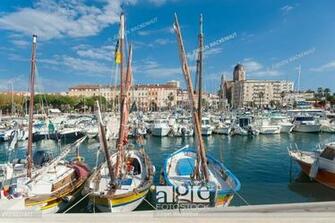 Harbor In The Background Basilica Notre Dame Of Victoire