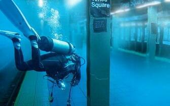 Scuba Diver In Subway Picture
