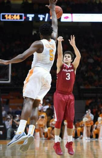 Arkansas Guard Dusty Hannahs Shoots A Pointer Over Tennessee