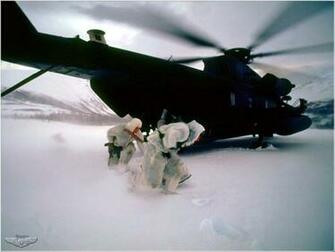 Military Navy Seals Egress From A Mh 53j Transport Wallpaper