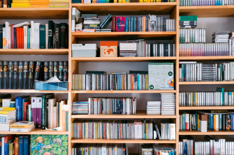 Bookshelf With Books Wallpaper