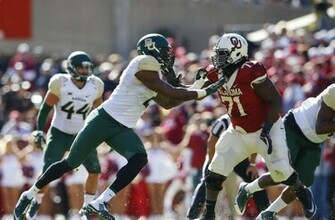 Shawn Oakman Rushes Against Oklahoma Sooners Offensive Tackle Tyrus