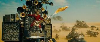 Mad Max Fury Road S Flamethrower Guitar Guy Has A Backstory