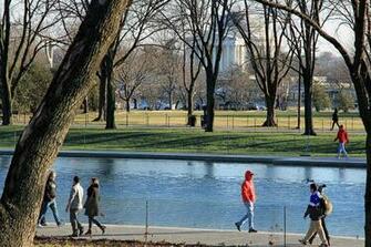 The Jefferson Memorial Looms In Background Photograph By