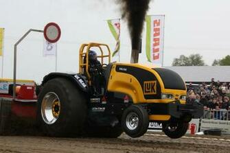 Vehicles Pulling Tractor Wallpaper
