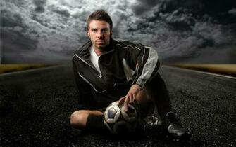 Sexy Football Player Standing Wallpaper