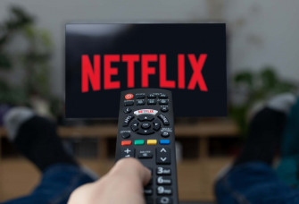 Netflix Logo On Television Background Wallpaper
