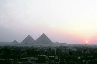 Sunset Of Cairo Egypt Skyline With The Great Pyramids In