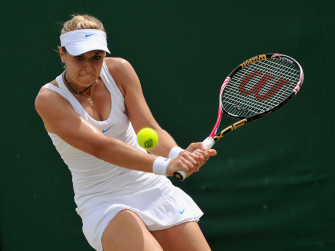 Sabine Lisicki In Cut The Ball Open Wallpaper