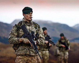 Members Of Commando Fleet Protection Group During A Patrol Wallpaper