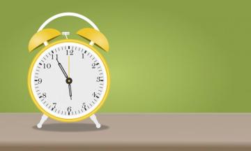 Cartoon Alarm Clock Isolated On Green Background Vector Art