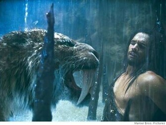 By A Saber Tooth Tiger In Scene From Warner Bros Pictures