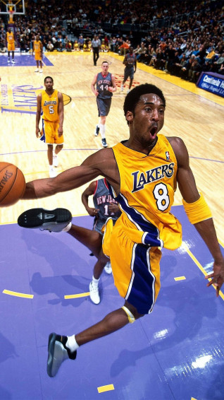 Kobe Bryant The Sports Legend Smiling Beside His