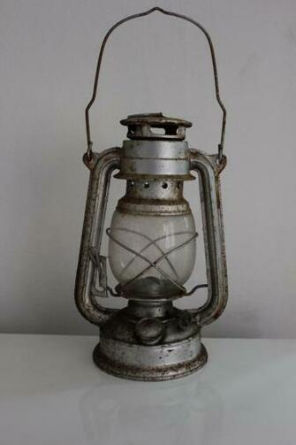 Oil Lamp By The Night Bird