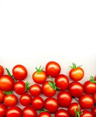 Bright Red Tomatoes Isolated On A White Background Royalty