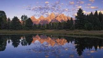 Mountain Reflection In The Water Screensaver Wallpaper