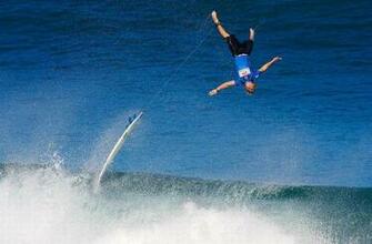 Of Surfer Flying Over A Huge Breaking Wave Banzai Pipeline Hawaii