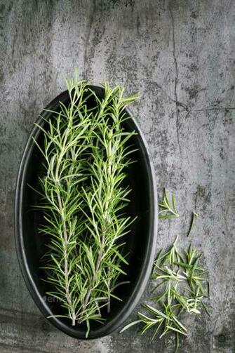Fresh Rosemary Top On Grunge Wood Background Stock Photo By