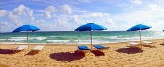 Lounge Chairs And Beach Umbrellas On The Fort Lauderdale