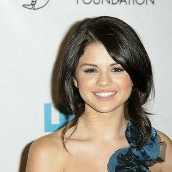 Selena Gomez In Blue Open Dress Wallpaper For iPad