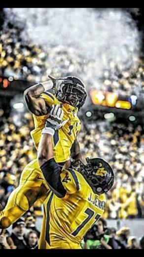 The Wvu Mountaineers Tavon Austin Josh Jenkins Football
