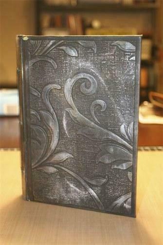 Embossed Wallpaper Over A Brick Or Cement Block Wall