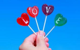 Four Assorted Color Lollipops Love Candies HD Wallpaper
