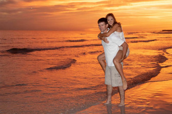 Couple At Beach Piggy Back Ride Picture Wallpaper
