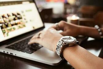HD Wallpaper Girl With Watches Typing On Macbook Cafe Desk