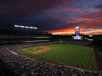 Coors Field At Night The Sun Sets Over
