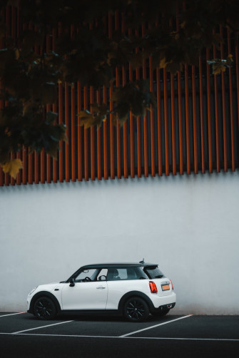 White Car Parked Beside Brown Wall Photo Netherlands Image